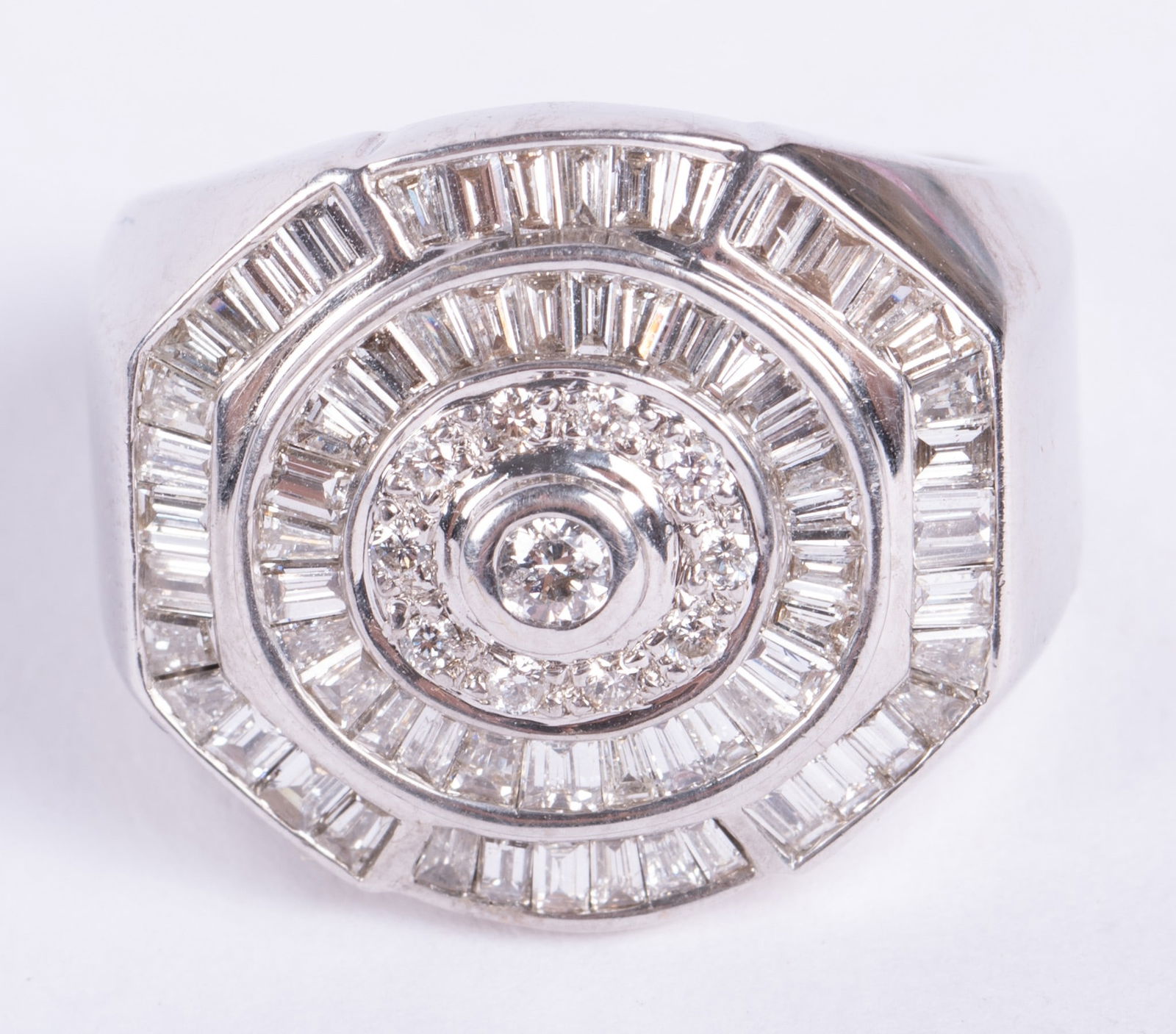 18kt White Gold and Diamond Ring: 18kt White Gold and Diamond Ring 18kt white gold diamond ring with hexagon shape top with 3.38 cttw diamonds. Size 8. Some inclusions on the baguette