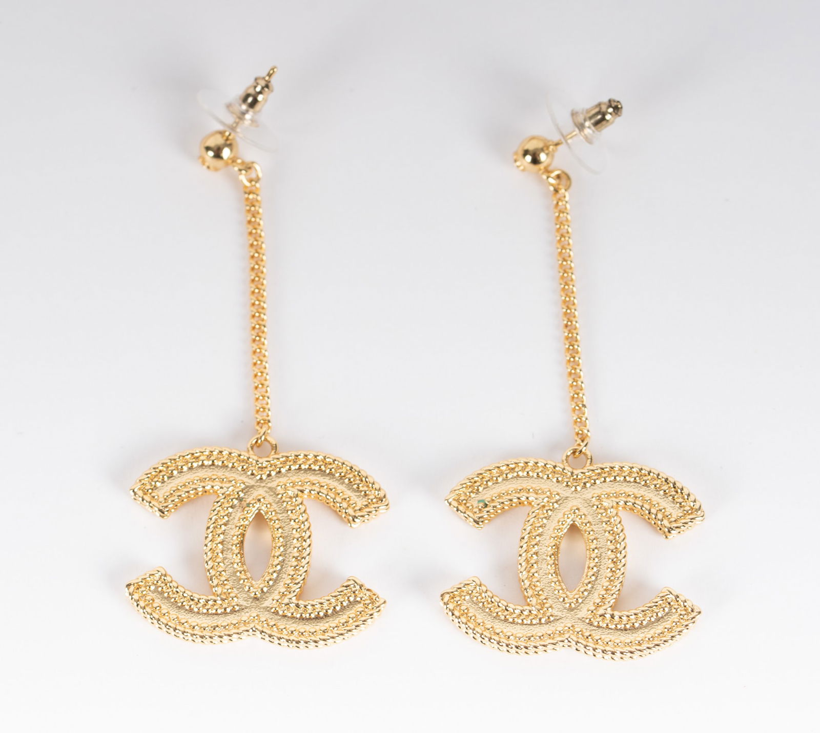 Chanel Gold CC Drop Pierced Earrings: Chanel Gold CC Drop Pierced Earringswith original box; length of drop 2 3/8 inches