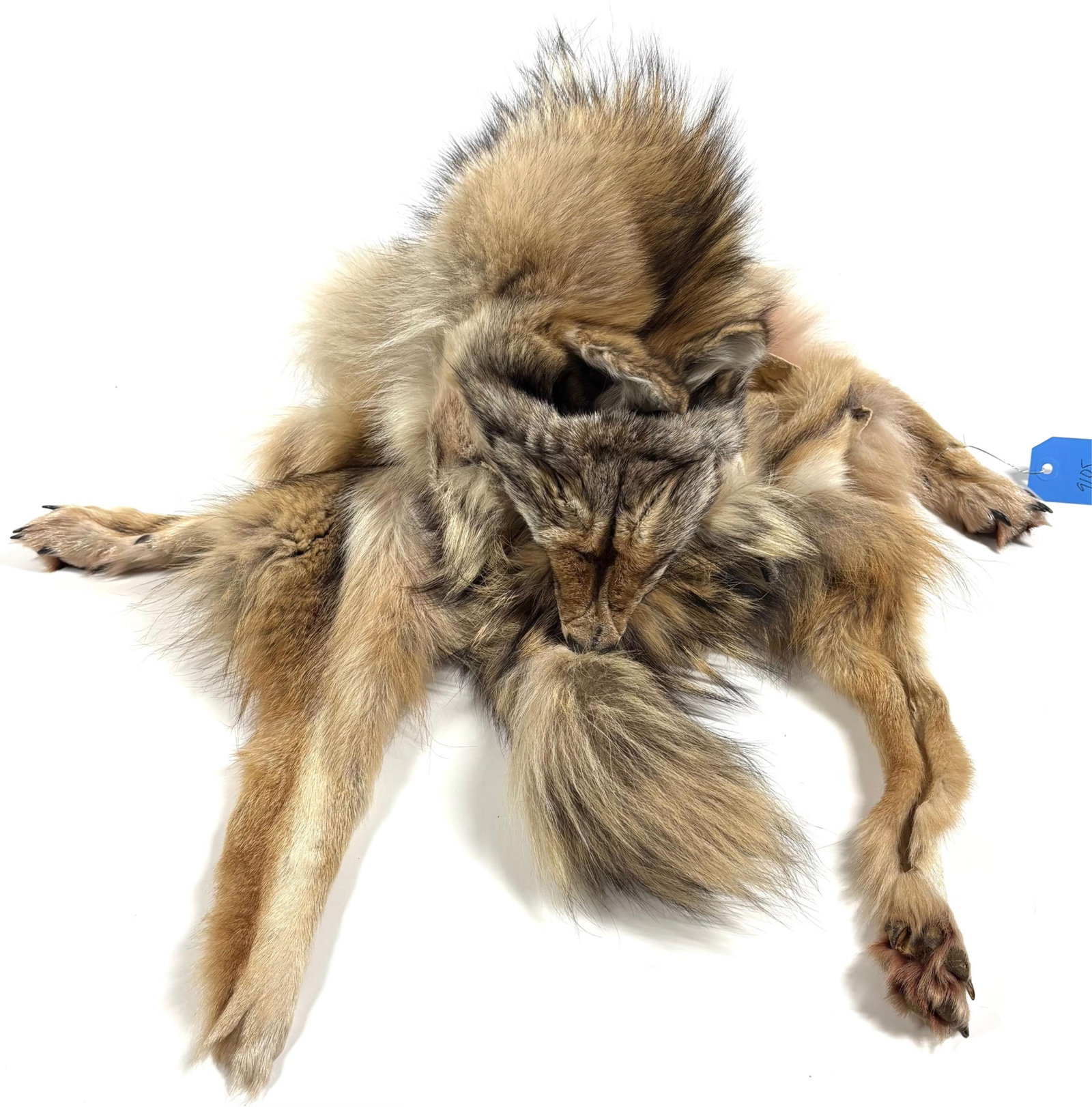 Coyote Mountain Man Trapper Fur Hat With Martens: Coyote Mountain Man Trapper Fur Hat With MartensCoyote pelts with a bill with mounted face to be worn as a hat with Martens paws hanging from each side; 38 inches from bill to foot. Signed inside hat