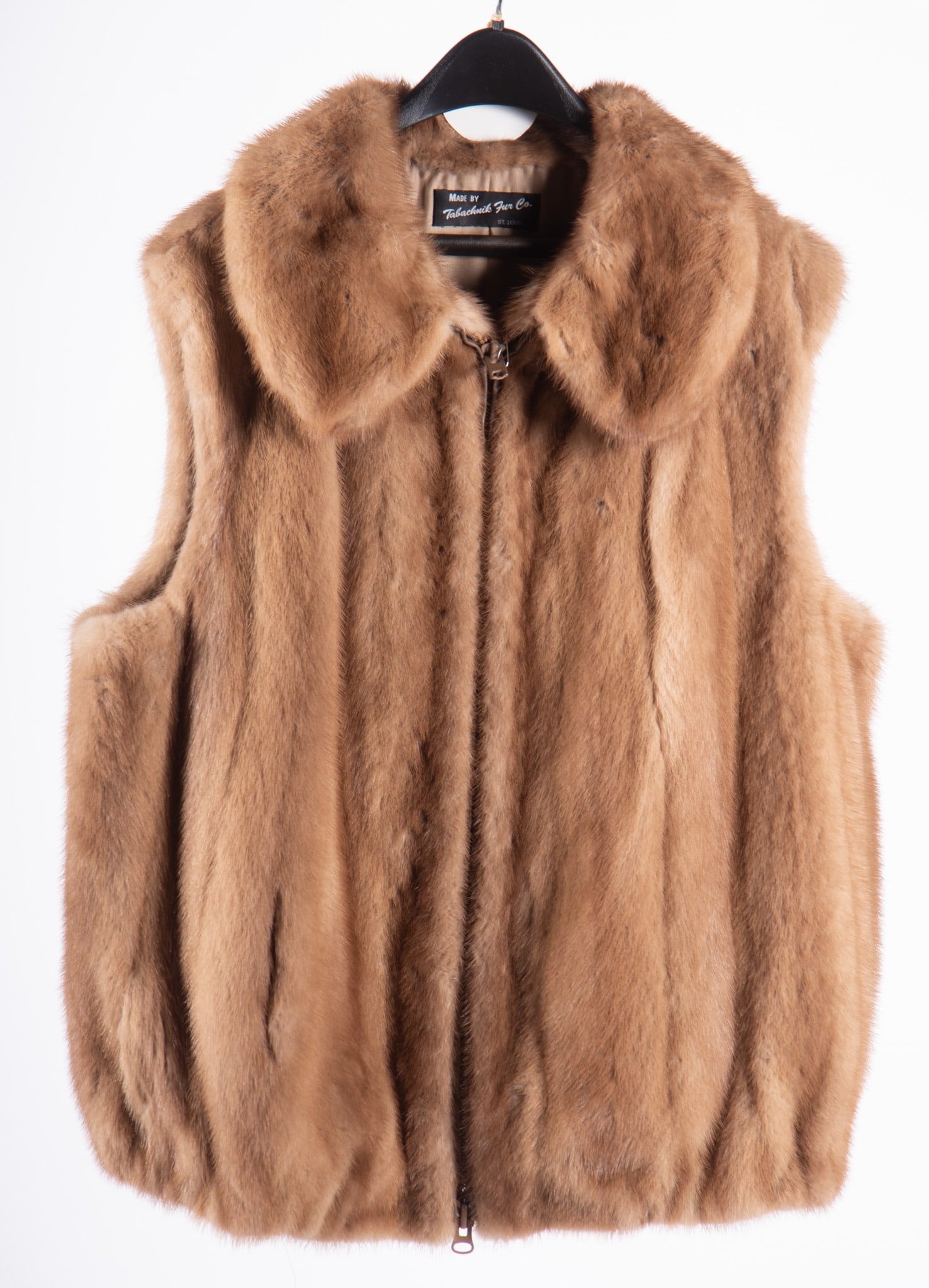 Natural Autumn Haze Mink Vest Made By Tabachuik Fur Co., St. Louis: Natural Autumn Haze Mink Vest Made By Tabachuik Fur Co., St. LouisMink vest with Peter Pan collar, elastic at bottom vest, zippered closure and 2 outside pockets.Size extra large, pit to pit 26.25", h