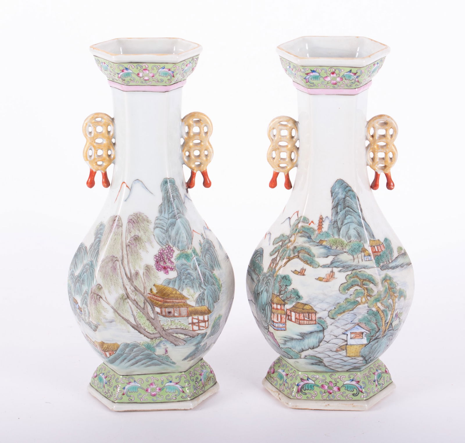 Pair of Chinese Porcelain Vases: Pair of Chinese Porcelain VasesStylized handles, continuous scene of a village in a river landscape. Six character mark on bases.13 1/4 x 6 x 4 1/4 inches