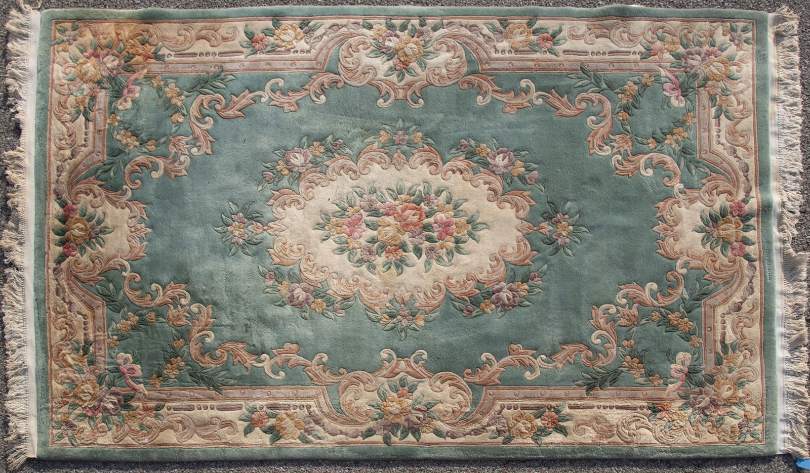Handwoven Aubusson Design Room Rug: Handwoven Aubusson Design Room Rug Central floral medallion on an aqua field with floral and vine spandrels within a wide foliate border. 5' 11" x 9' 3"