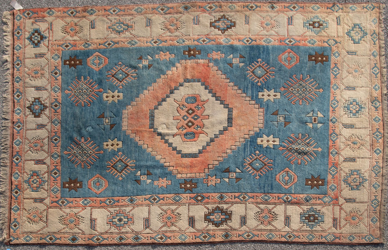 Semi Antique Turkish Oushak Room Rug: Semi Antique Turkish Oushak Room Rug Central stepped medallion in shades of orange, blue and ivory centering a blue field with all over various geometric medallions, all within an ivory primary