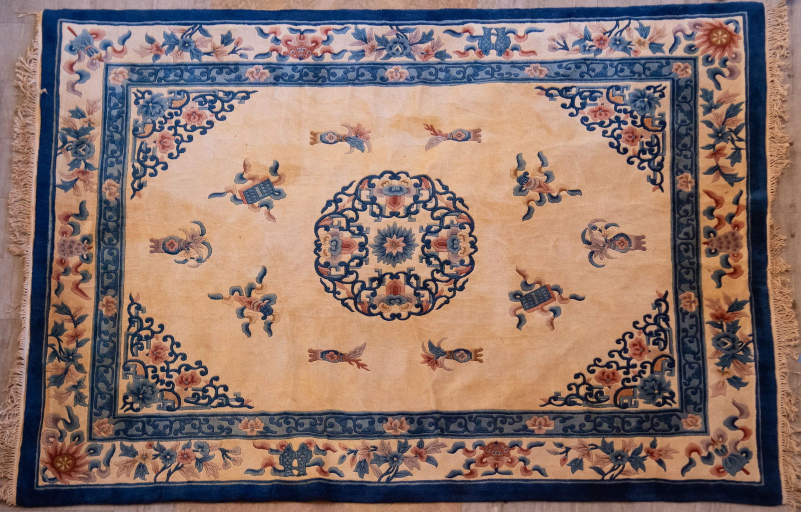 Handwoven Chinese Art Deco Room Rug: Handwoven Chinese Art Deco Room Rug Central medallion with floral and cloud band motifs on an open tan field with all around urn decoration centering geometric and floral spandrels along with a guard