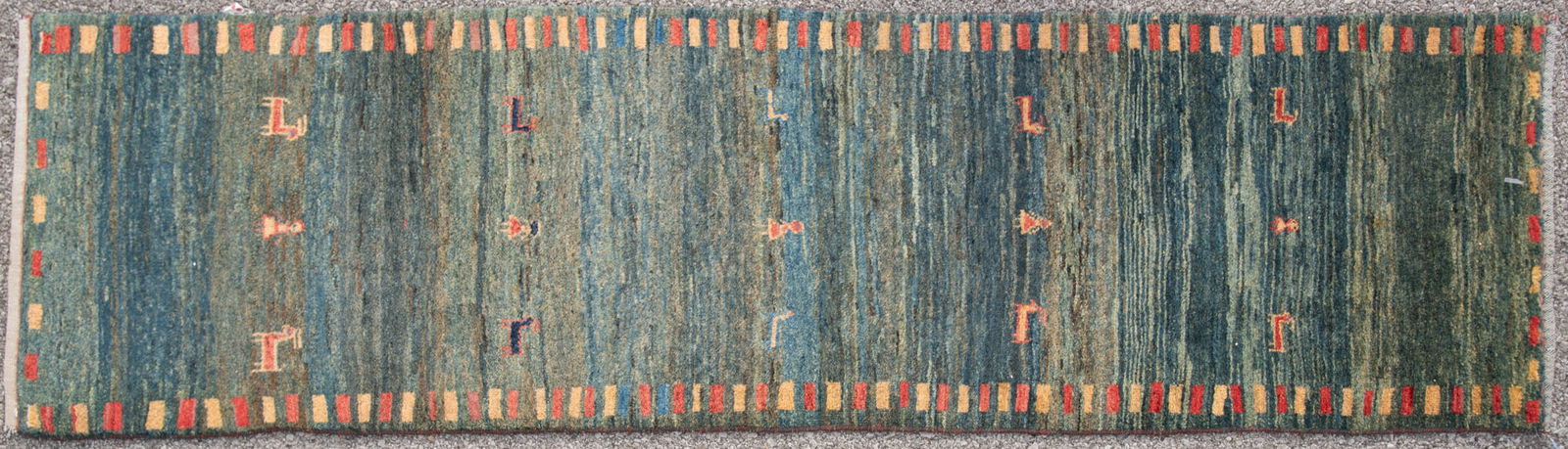 Modern Handwoven Runner: Modern Handwoven Runner Blue green field with figural motifs centering a border having rectangles in alternating colors. 2' 7" x 9' 3"