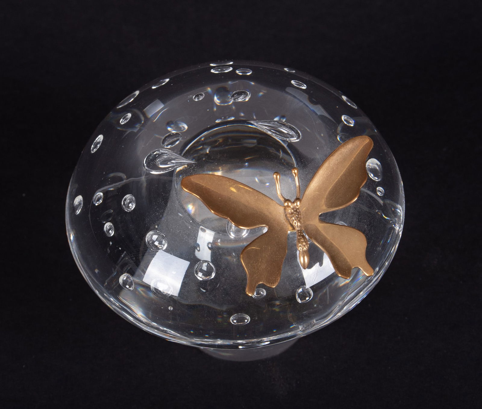 A Crystal Mushroom with 18K Butterfly, James Houston for Steuben: A Crystal Mushroom with 18K Butterfly, James Houston for SteubenCorning NY, from a 1964 design, a charming crystal mushroom with internal bubbles, supporting a marked 18K gold butterfly. Signed Steube