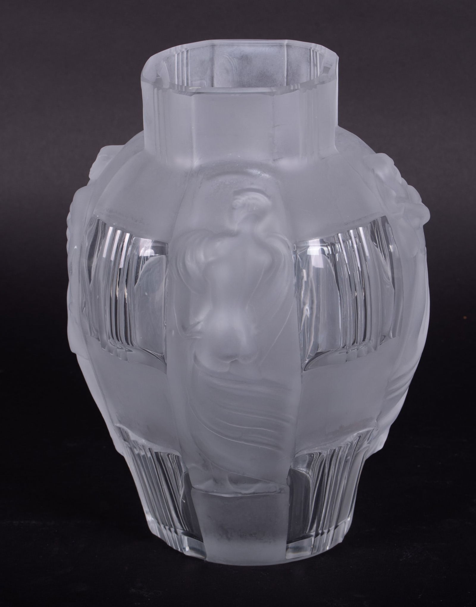 Lalique France Art Deco Vase: Lalique France Art Deco VaseA clear and frosted vase with four figures on the the corners. Each figure in a different state of motion with draped fabric surrounding them. Octagonal shaped top. Signed