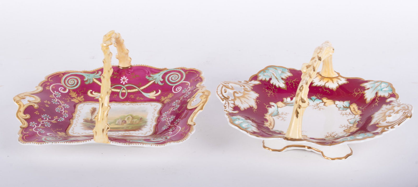 Two Unusual Antique Staffordshire Porcelain Handled Pastry Baskets: Two Unusual Antique Staffordshire Porcelain Handled Pastry BasketsEngland, mid-19th century, each basket having a wide maroon border with floral highlights and simulated tree limb handles, one basket