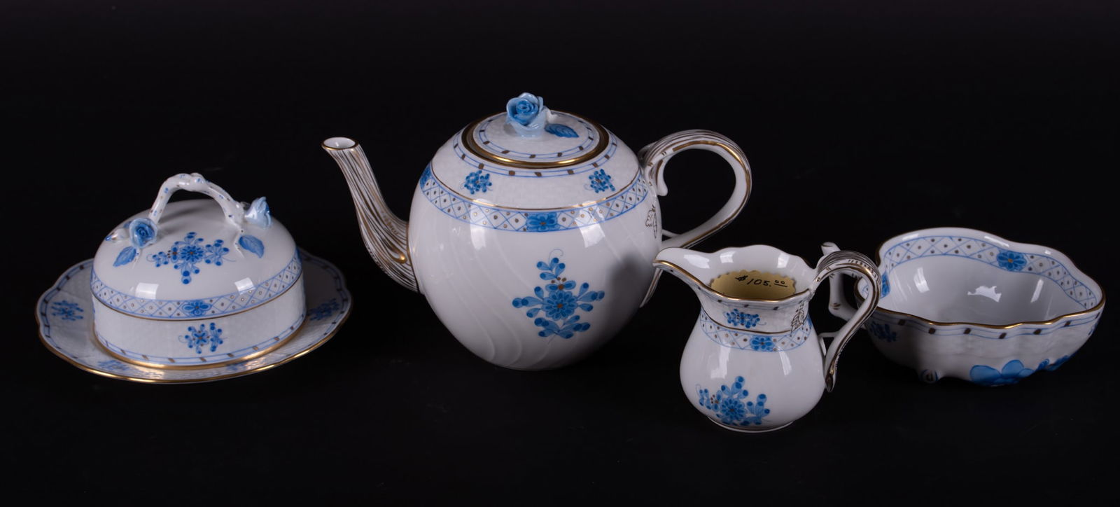 A Collection of Four Herend Blue Garden Floral Serving Pieces: A Collection of Four Herend Blue Garden Floral Serving PiecesHungary, four pieces of blue and white floral pieces in the Blue Garden series to including: a 3 1/4 inch tall creamer, a 5 1/4 inch long l