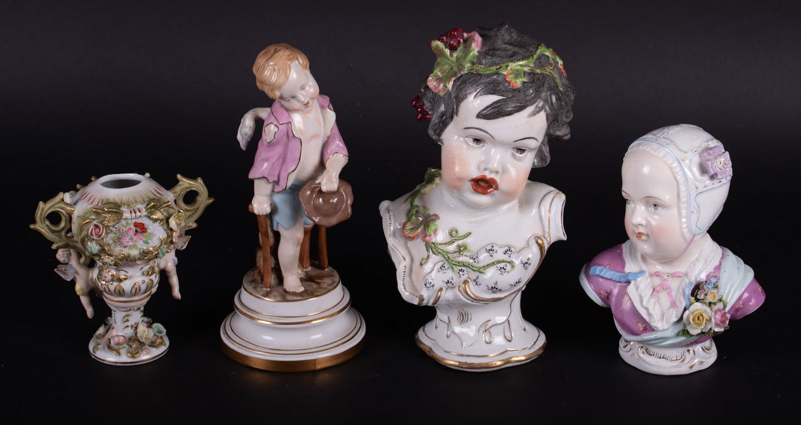 A Collection of Four Continental Meissen Style Porcelains: A Collection of Four Continental Meissen Style PorcelainsThe lot includes a 6 1/4 inch tall bust of a young child by Sitzendorf, a 8 3/4 inch tall bust of a young Bacchante (likely Samson), a 8 1/2 in
