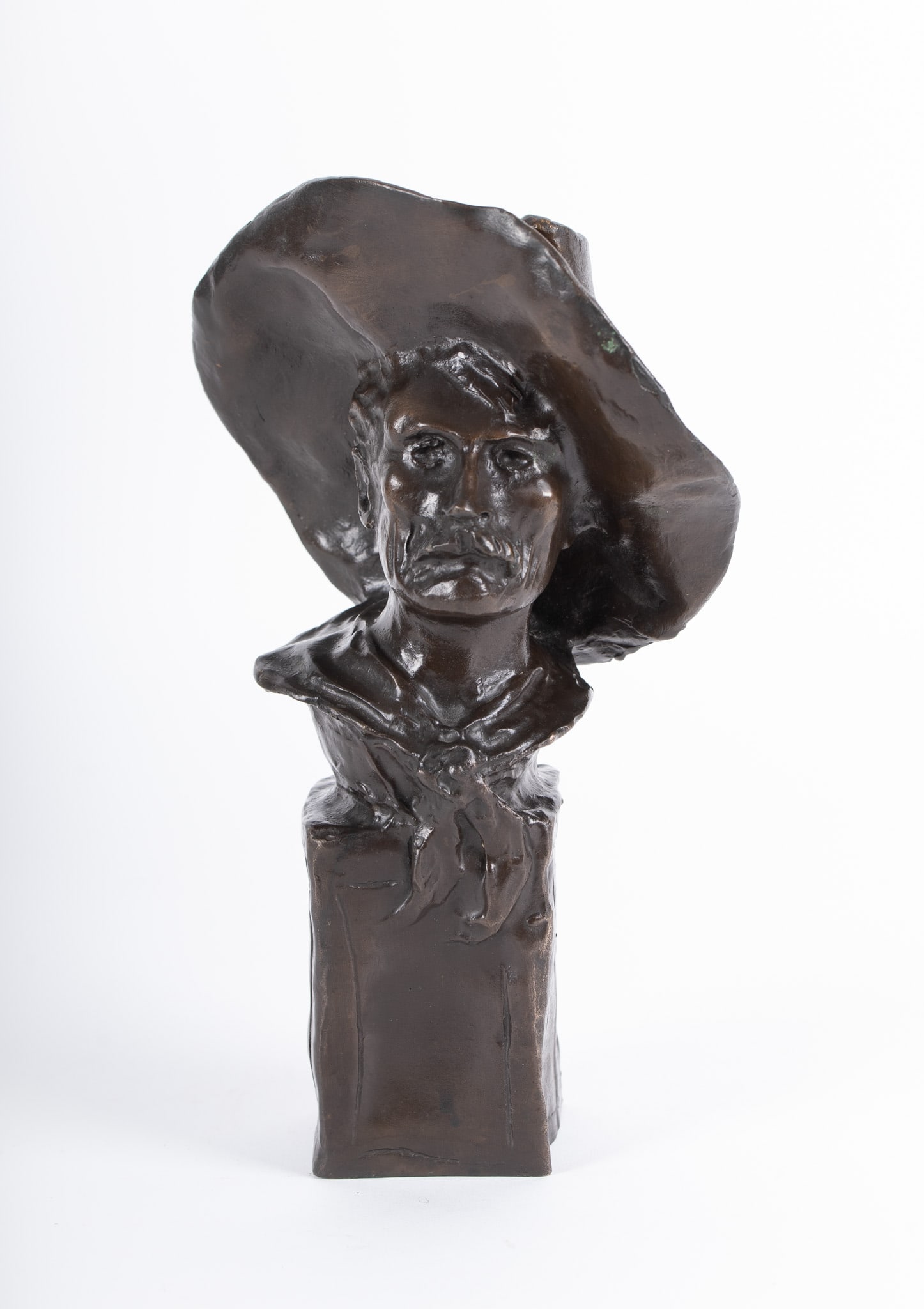 Frederic Sackrider Remington, American (1861-1909), The Sergeant, bronze with dark brown patina: Frederic Sackrider RemingtonAmerican, (1861-1909)The Sergeantbronze with dark brown patinaA mustachioed and weathered-face bronze sculpture of a soldier, originally designed by Remington in 1904 as a