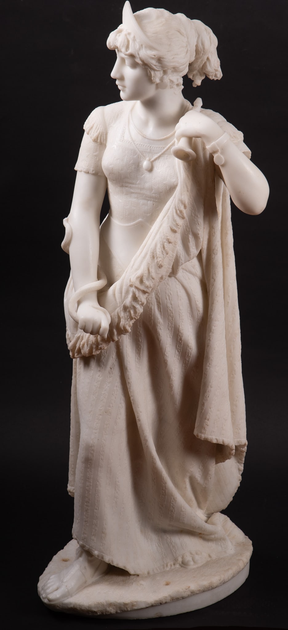 Large Carrara Marble Sculpture of a Goddess, Pasquale Romanelli: Large Carrara Marble Sculpture of a Goddess, Pasquale Romanelli This large sculpture possibly depicting the goddess Columbia, American Personification. She has a dress with embroidered stars, a