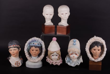 A Collection of Seven Cybis Busts of Children