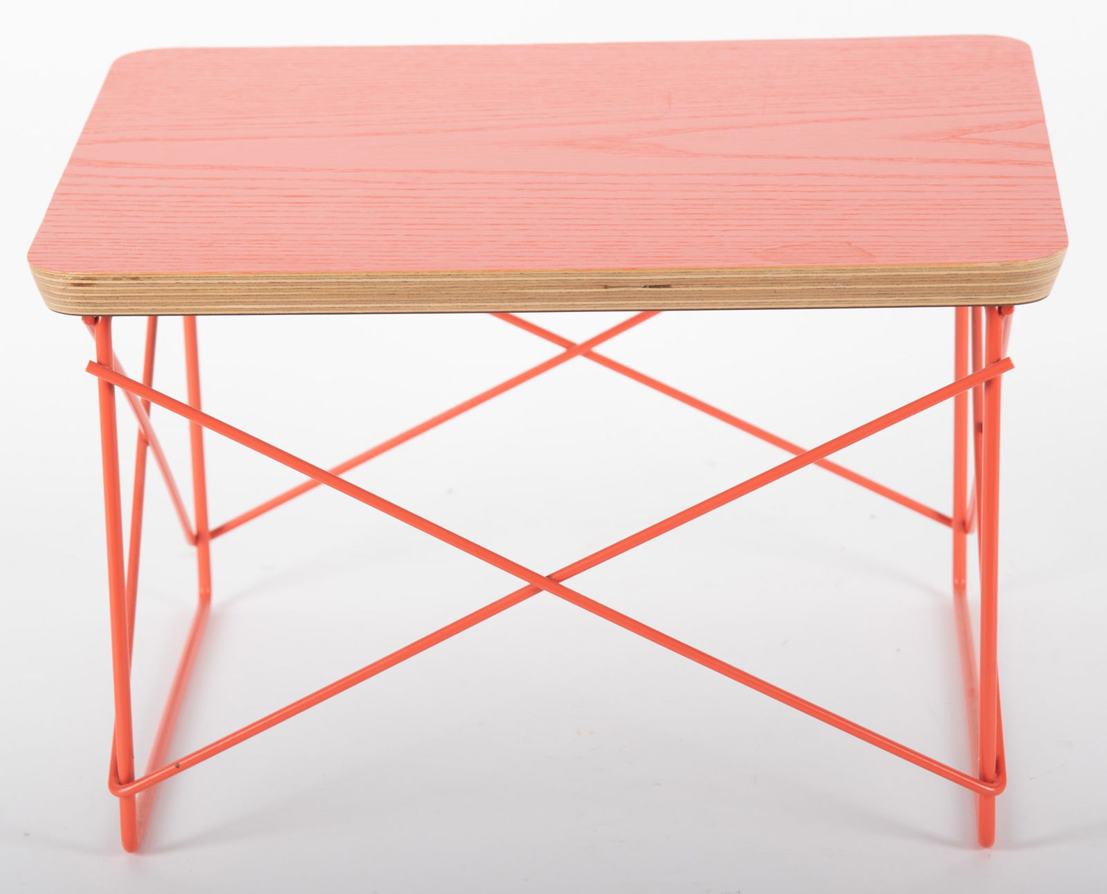 Eames for Herman Miller Wire Base Low Table: Eames for Herman Miller Wire Base Low Table Red-orange ash laminate, with label. 10 x 15 1/2 x 13 1/4 inches
