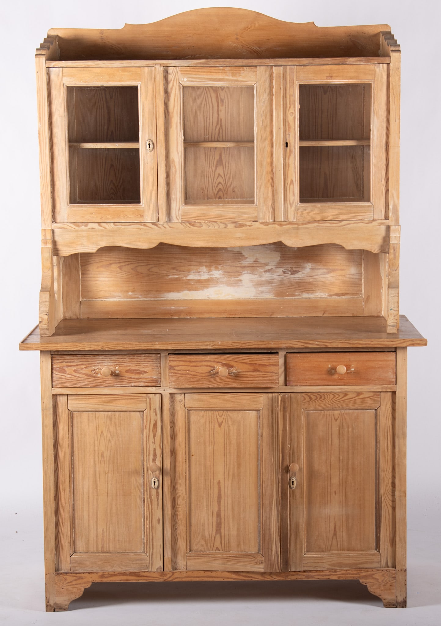 Semi-Antique Two Member Hutch: Semi-Antique Two Member Hutch Having a shaped three quarter cornice with three glazed doors below. The lower section having three drawers above three inset panel doors ending on shaped bracket feet.