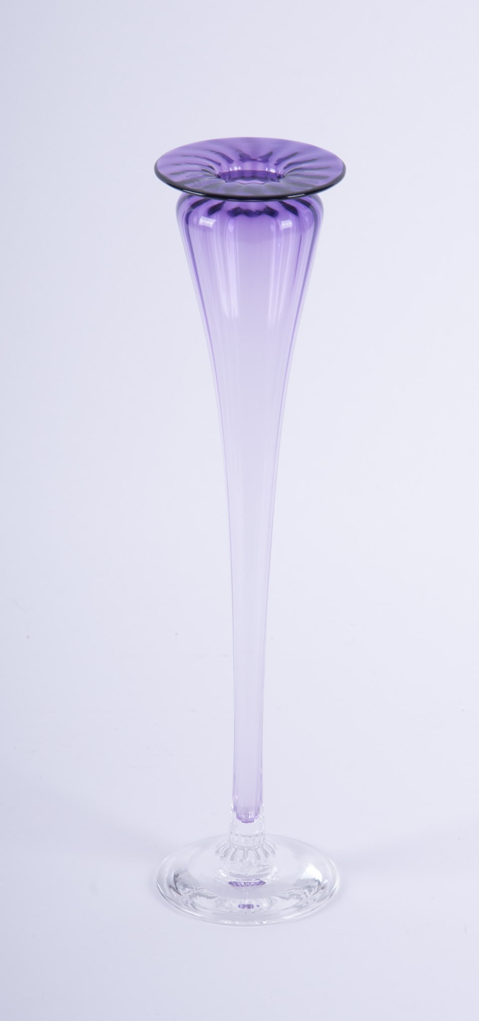 A Young & Constantine Studio Art Glass Vase: A Young & Constantine Studio Art Glass Vase Massachusetts, late 20th century, a tall and graceful amethyst to clear art glass vase from the American studio of Kathleen Young and Christopher