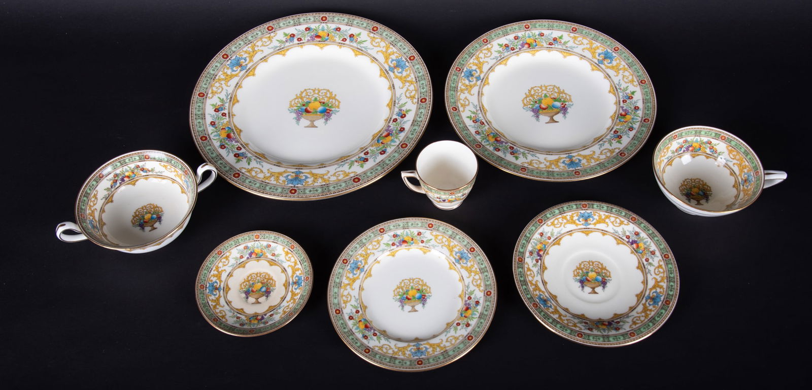 An Extensive Minton Porcelain Dinner Service, Pattern H3956, Circa 1926: An Extensive Minton Porcelain Dinner Service, Pattern H3956, Circa 1926 England, circa 1926, a large dinner service, trimmed in green with designs of fruits and flowers, marked to reverse, H3956