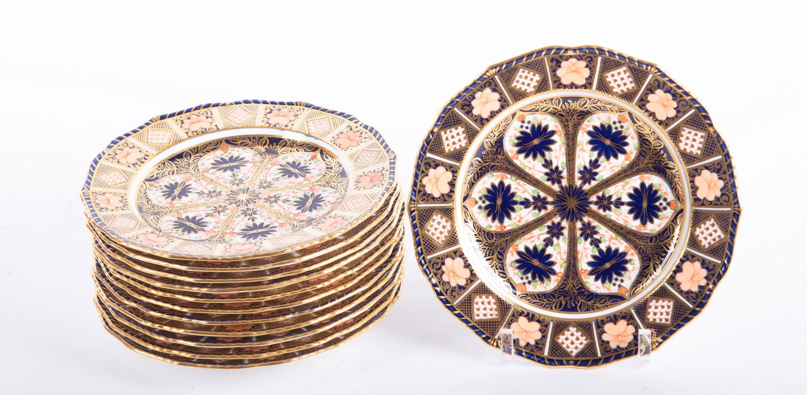 Twelve English Royal Crown Derby Late 19th Century Imari Plates: Twelve English Royal Crown Derby Late 19th Century Imari Plates England, late 19th century, a very fine set of twelve Derby plates in the Old Imari pattern #1128, bearing year cypher for 1886. The