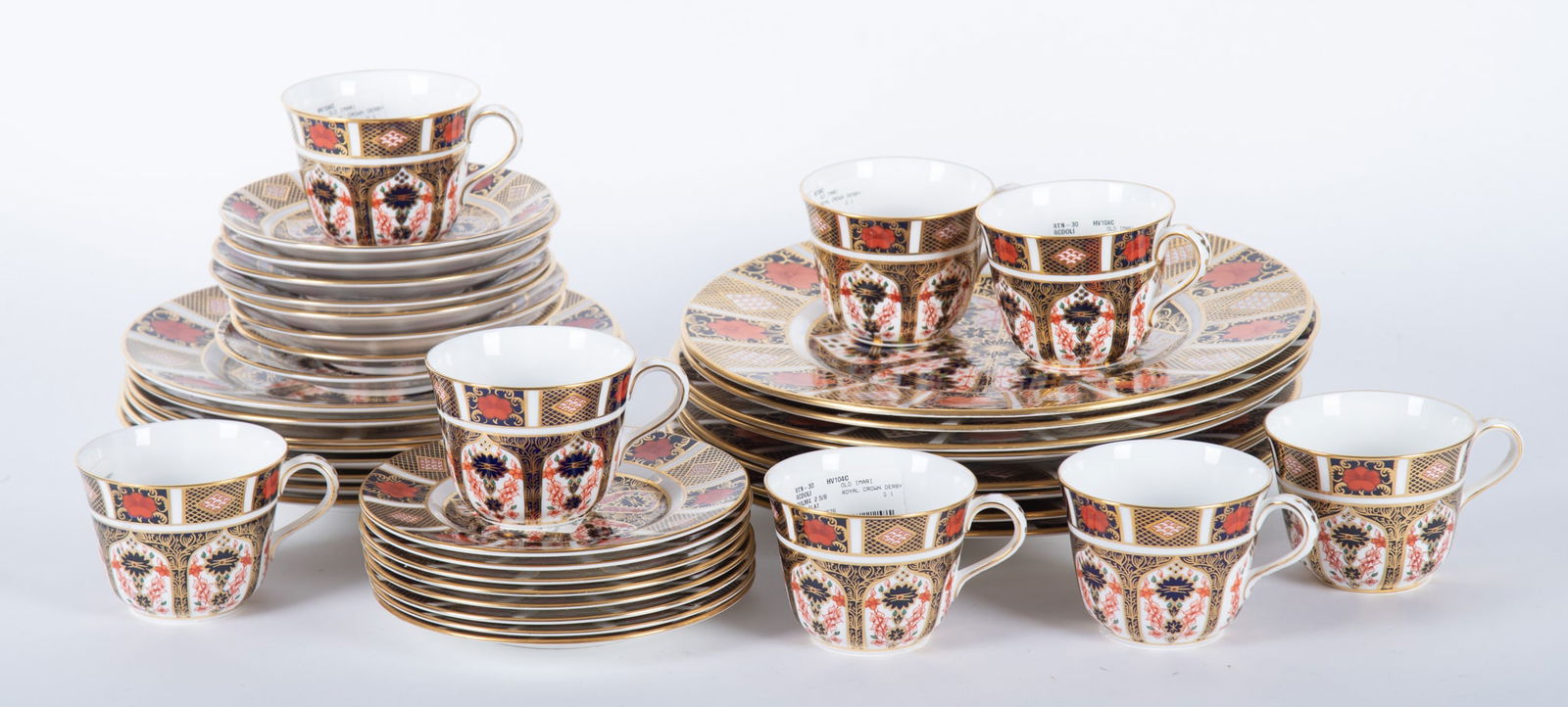 An Assembled Royal Crown Derby Old Imari Service for Eight: An Assembled Royal Crown Derby Old Imari Service for Eight 8 cups, 8 saucers, 8 bread and butter plates, 8 salad plates, 8 dinner plates. Assembled set from different years. Marked on the underside.