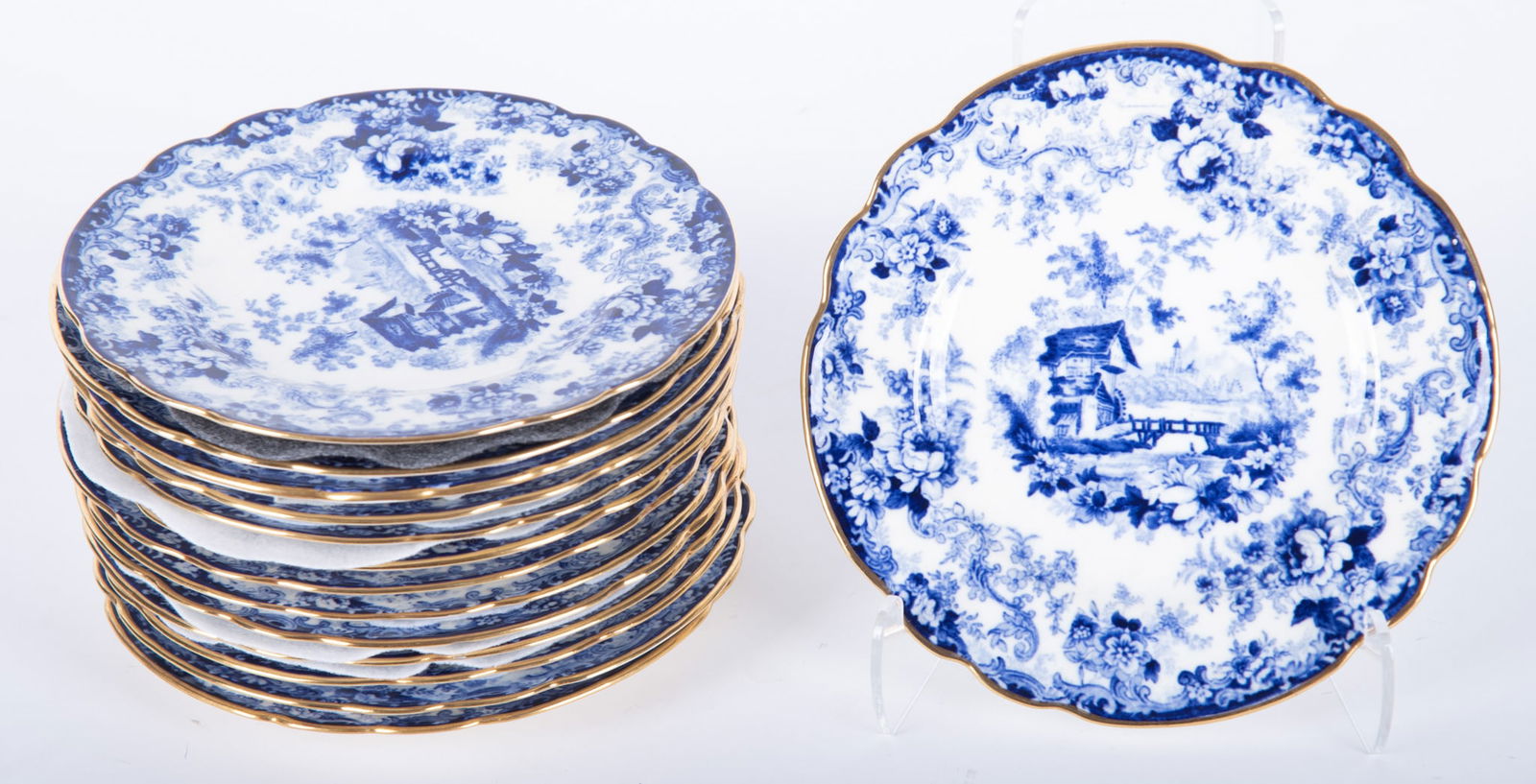 A Set of Fourteen Antique Blue Transferware Plates, Genevese by Minton: A Set of Fourteen Antique Blue Transferware Plates, Genevese by Minton England, late 19th century, an assembled set of fourteen 6 3/4 inch desert plates in the sought after Genevese pattern, first