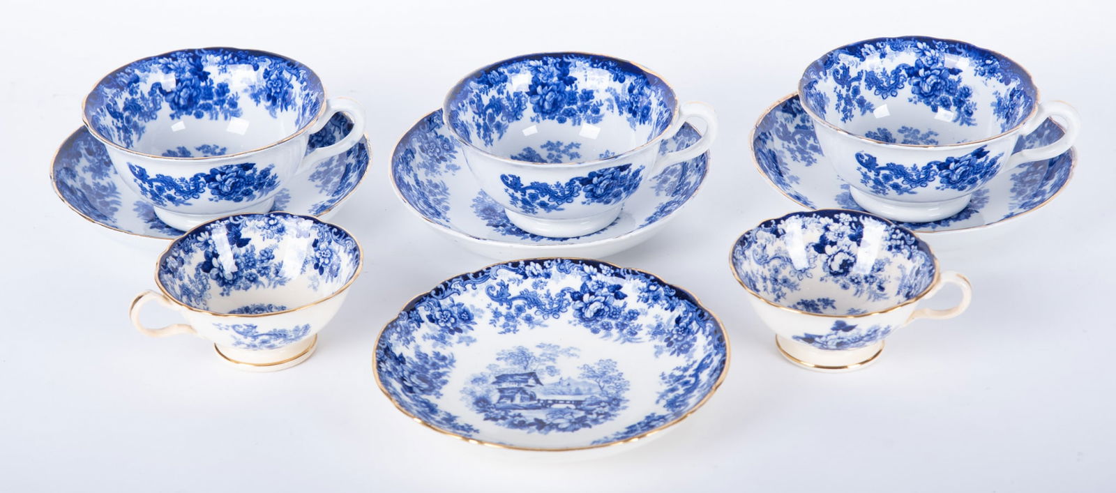 Three Large Blue and White Transferware Coffee Cups and Saucers, Genevese by Minton: Three Large Blue and White Transferware Coffee Cups and Saucers, Genevese by Minton England, late 19th/early 20th century, three hard to find large shaped coffee cups and saucers in the Genevese