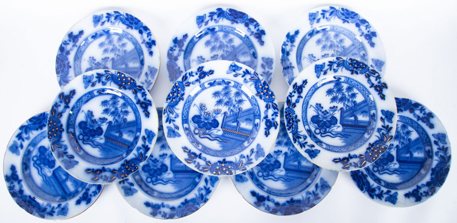 A Collection of Ten Antique Flow Blue Dinner Plates, Oriental by Samuel Alcock and Sons: A Collection of Ten Antique Flow Blue Dinner Plates, Oriental by Samuel Alcock and Sons Staffordshire England, circa 1840, an assembled collection of 10 dinner plates in the Oriental pattern by