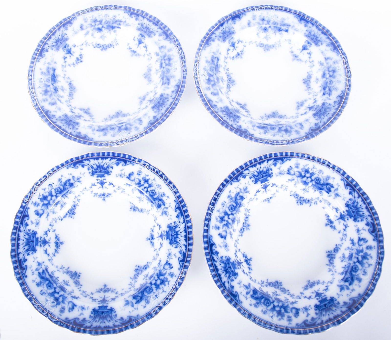 Four Large Flow Blue Serving Bowls, Coronet by Sampson Hancock and Sons: Four Large Flow Blue Serving Bowls, Coronet by Sampson Hancock and SonsStaffordshire, early 20th century, a rarely found set of 4 serving bowls, having scallop and gilt edge rim, featuring a classic V