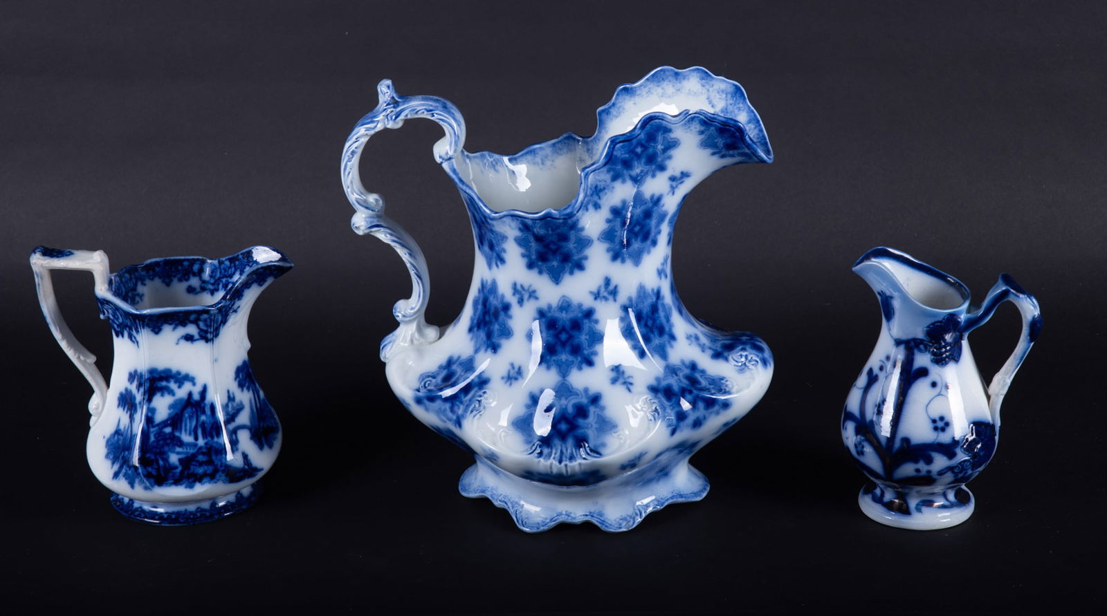 Three Antique Staffordshire Flow Blue Pitchers (1 of 4)