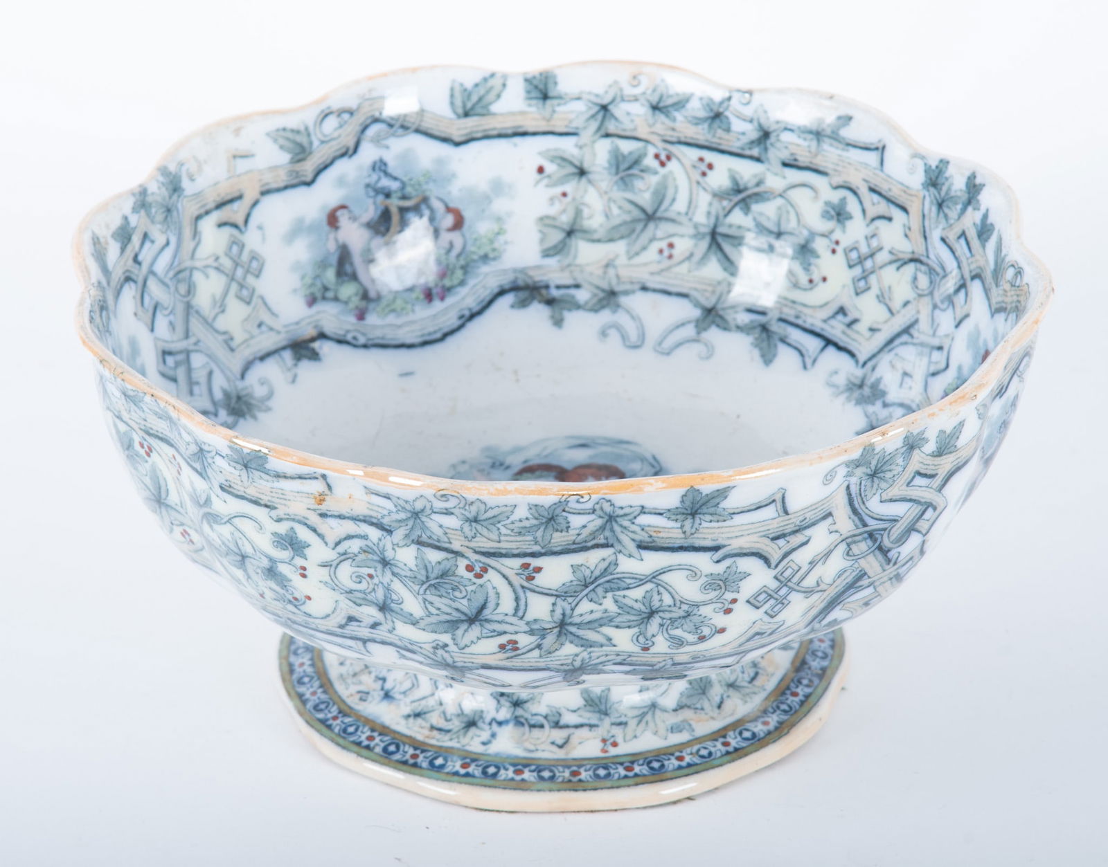 An Antique English Pottery Punch Bowl, Rustic by Furnivals: An Antique English Pottery Punch Bowl, Rustic by Furnivals England, late 19th century, an interesting transferware bowl designed in the Rustic pattern by Furnivals of Stoke-on-Trent, having vines of