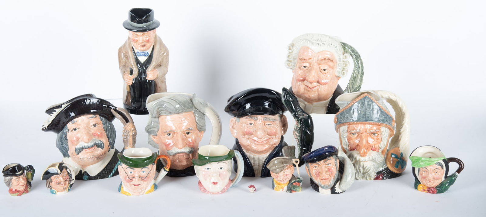 Assortment of Character Mugs featuring Royal Doulton and Staffordshire (1 of 3)