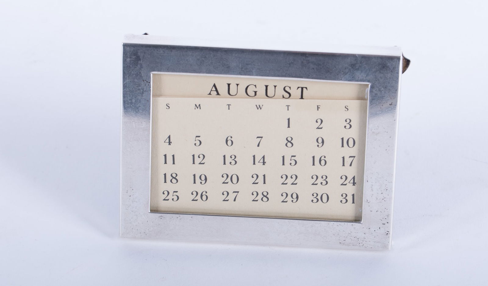 Tiffany & Co. Sterling Silver Perpetual Calendar: Tiffany & Co. Sterling Silver Perpetual Calendarmarked sterling, 23814, 925/1000. Sterling frame weight only 1.235 troy ounces2 7/8 x 3 3/4 inches