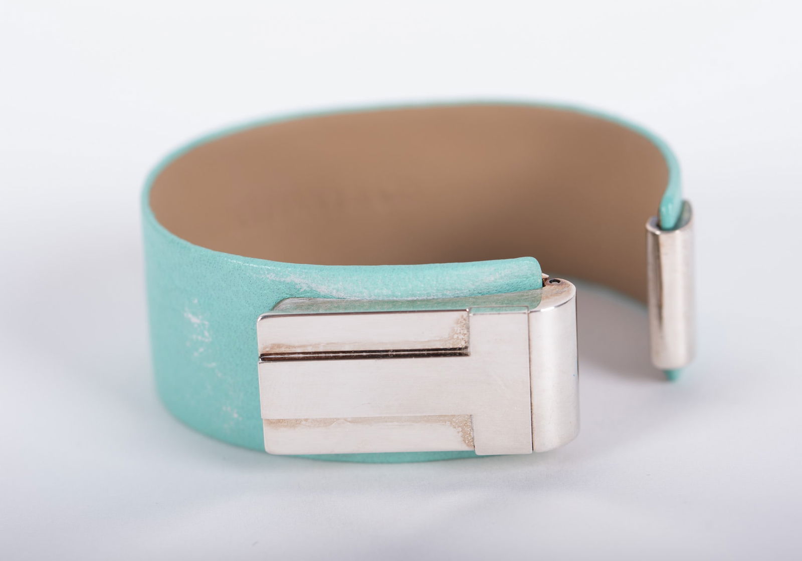 Tiffany T watch: Tiffany T watchLimited edition Tiffany watch from T Collection. Traditional Tiffany Blue leather band stamped on inside and sterling silver hardware. Rectangular face with flip top and small baguette