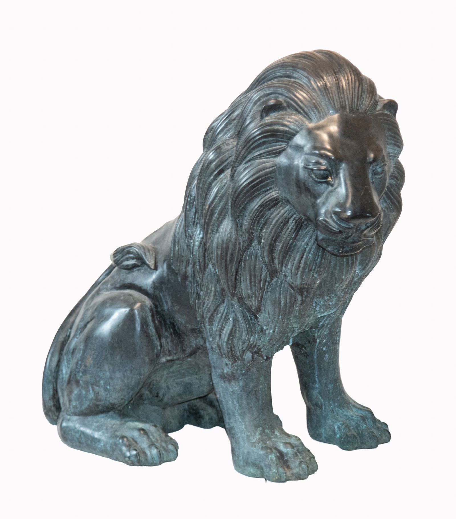 A Commanding Entry Sculpture of a Seated Lion: A Commanding Entry Sculpture of a Seated Lion A large patinated bronze sculpture of a majestic lion, the seated figure of entry or garden size dimensions. Approximately 40 inches tall, 19 inches