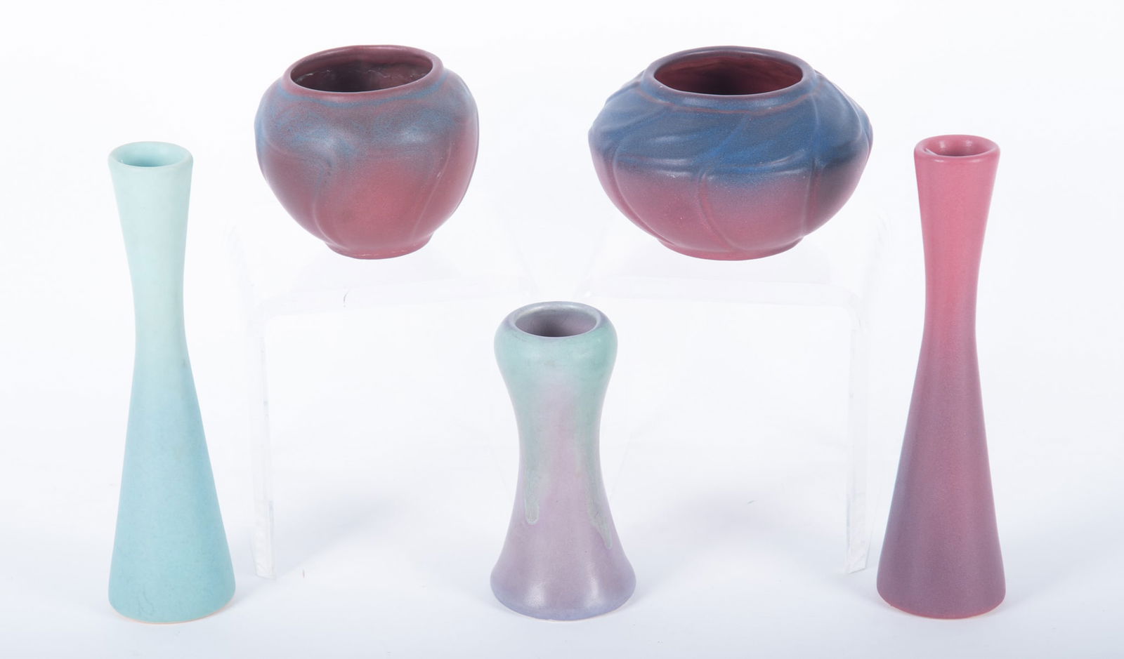 Van Briggle and Muncie Pottery: Van Briggle and Muncie Pottery Four pieces signed Van Briggle and one vase attributed to Muncie. Including two bowls in the mulberry glaze circa 1920s, and two ombre bud vases all signed Van Briggle.