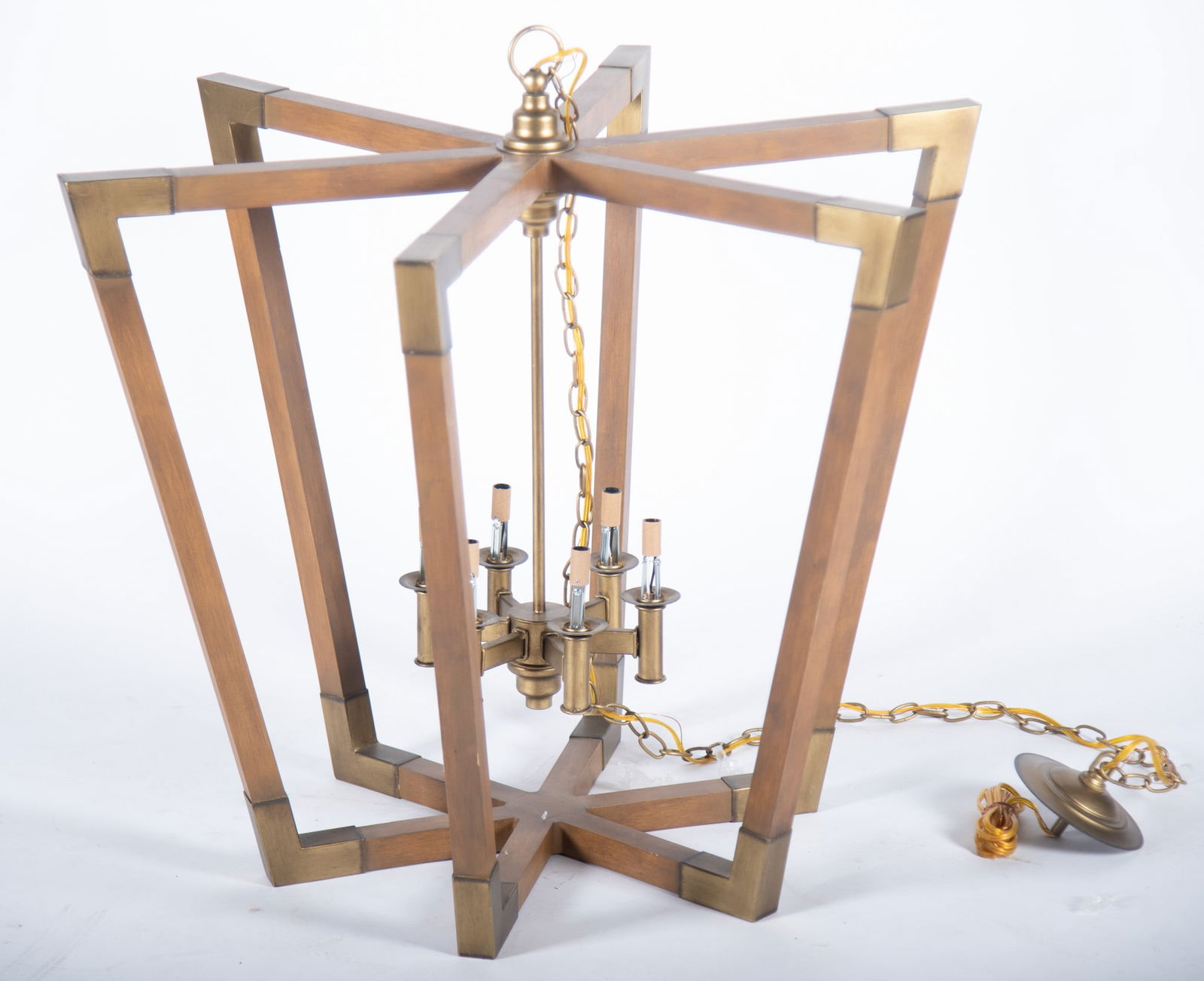 Mid Century Six-Light Brass and Chestnut Chandelier: Mid Century Six-Light Brass and Chestnut Chandelier A cage-form chandelier with six chestnut and brass-accented arms forming a hexagonal shape. Height: 29 inches; Diameter: 37 inches