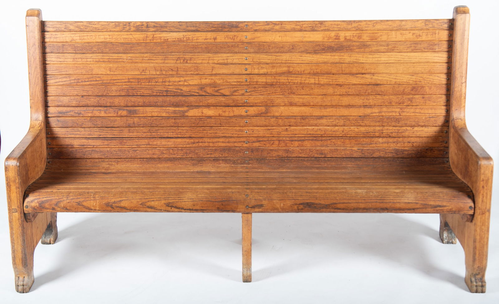 Early Twentieth Century American Long Bench: Early Twentieth Century American Long BenchTapering sides with sloped arms centering slatted back and seat on shaped legs.40 1/2 x 72 x 22 1/2 iches