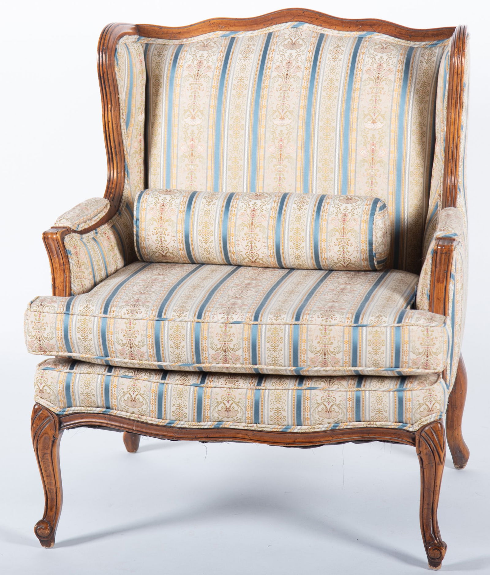 Antique French Louis XV Bergere: Antique French Louis XV BergereShaped head rail and sides with striped and floral upholstery and serpentine seat rail ending on carved cabriole legs.35 1/2 x 30 inches