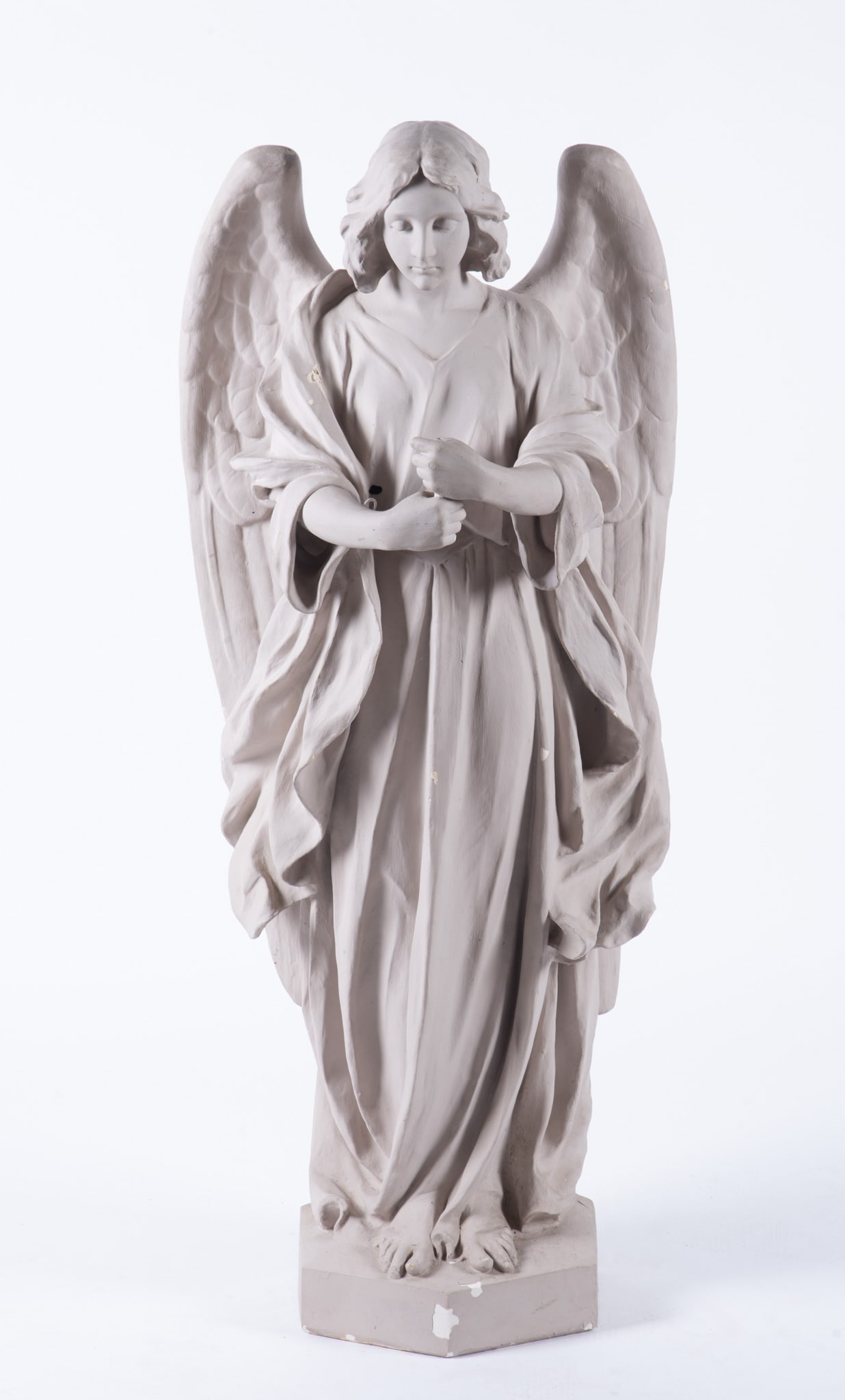 Large Scale Statue of an Angel: Large Scale Statue of an AngelDepicting a standing angel with flowing robes and detailed wings. Originally the statue held separate pieces such as lilies or a religious item.48 1/2 x 20 1/2 x 16 inche
