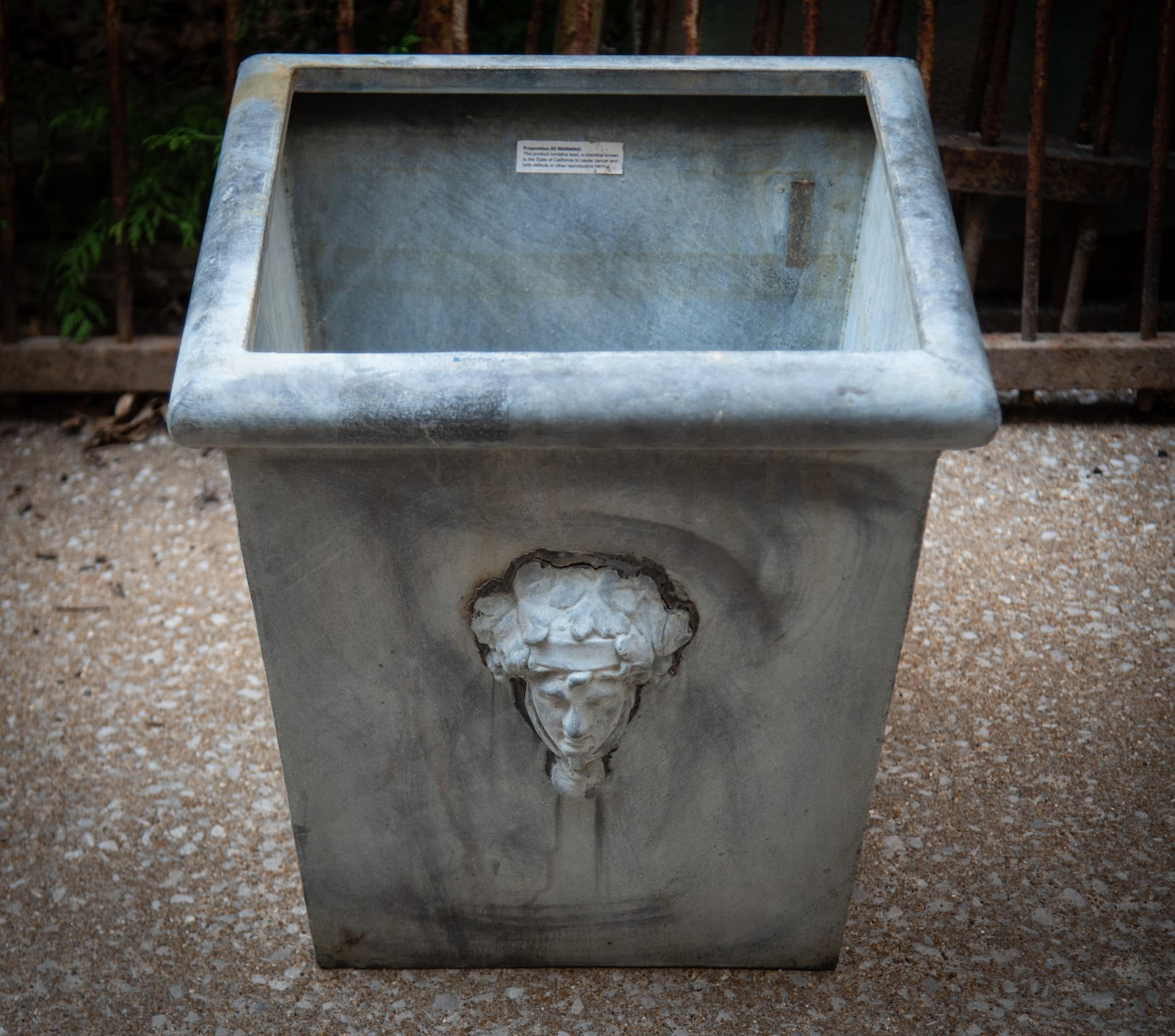 Neoclassical Style Zinc Planter: Neoclassical Style Zinc Planter The square top planter features a Greek figural head. 21 x 20 x 20 inches