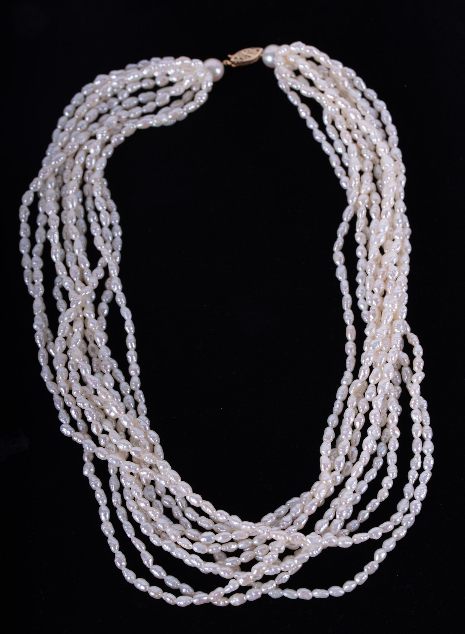 Ten Strand Pearl Necklace With 14K Yellow Gold Closure: Ten Strand Pearl Necklace With 14K Yellow Gold Closure Ten strand necklace with small freshwater white baroque pearls and 14k yellow gold fishhook closure