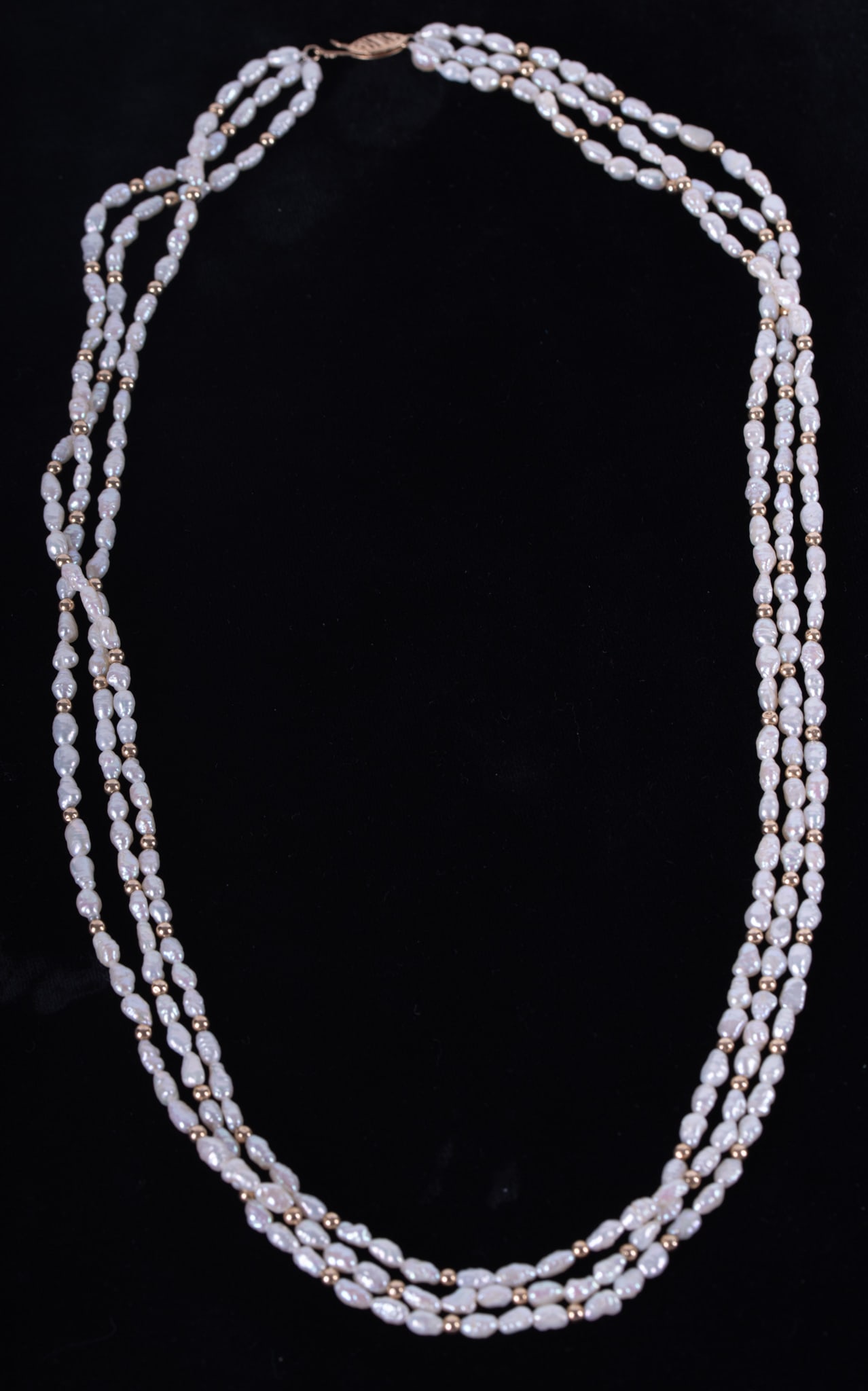 Three Strand Baroque Pearl and 14K Yellow Gold Bead Necklace: Three Strand Baroque Pearl and 14K Yellow Gold Bead Necklace Three strand baroque pearl necklace with 87 spacer beads of 14k yellow gold
