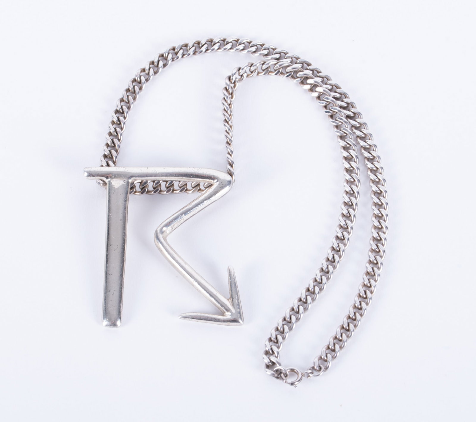 Interesting Sterling Necklace with an Arrow Pointing to the Heart: Interesting Sterling Necklace with an Arrow Pointing to the HeartThis necklace is 18 inches long and weighs 62.7g.