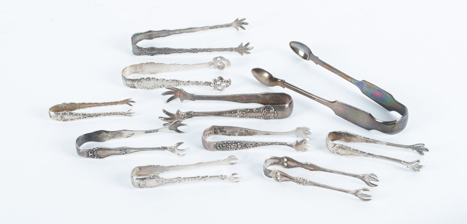 A Collection of Antique and Vintage Sterling Silver Ice and Sugar Tongs (1 of 2)