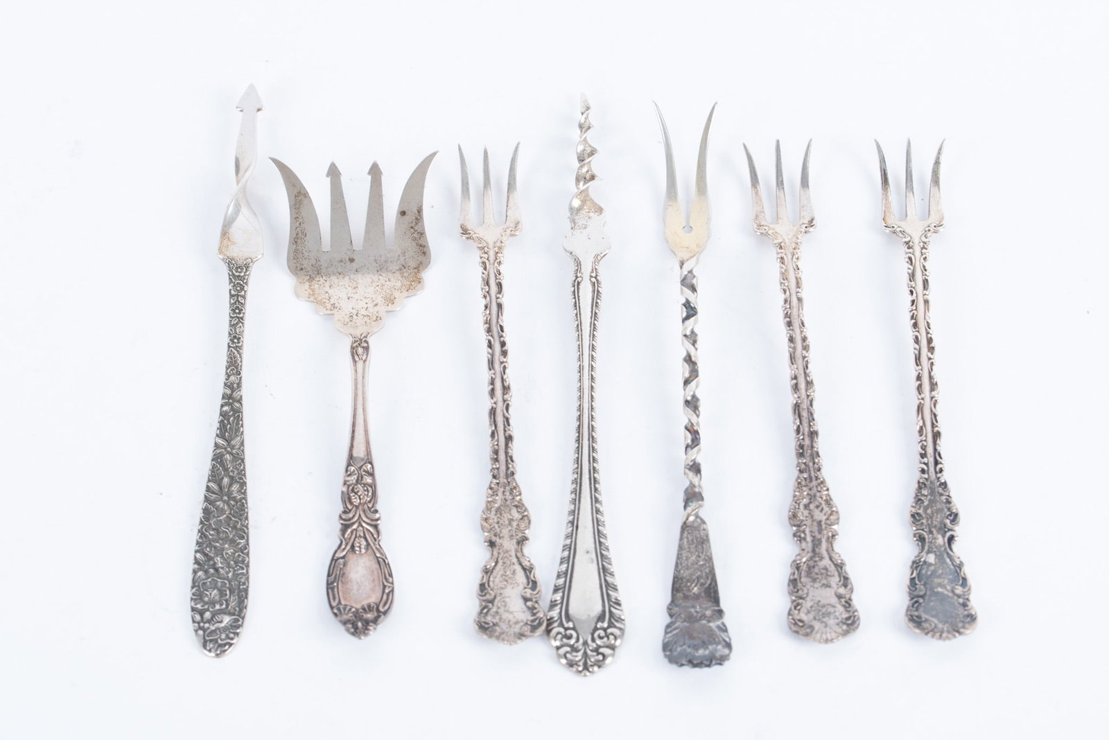 Seven Sterling Silver Cocktail Forks and Butter Picks (1 of 2)