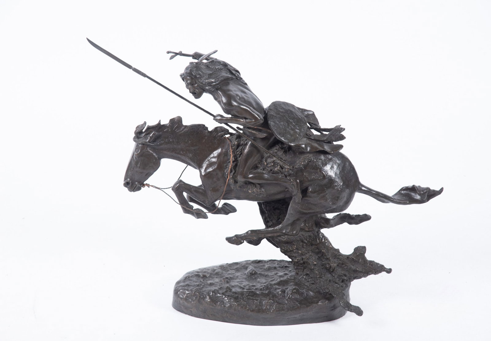 After Frederic Remington, The Cheyenne, recast bronze, Hekka Foundry stamp, and numbered 58/1000 (1 of 3)