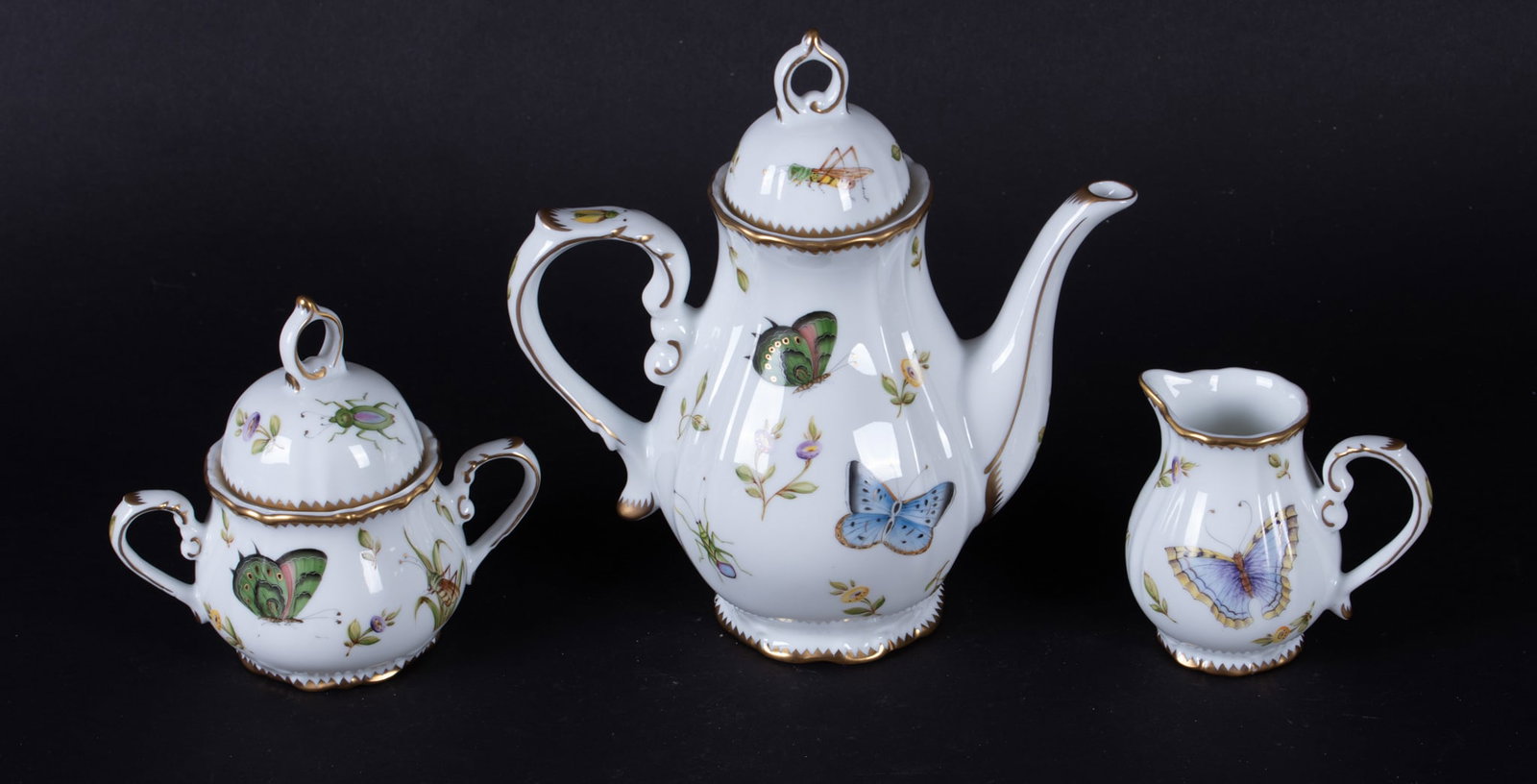 A Three Piece Hand Painted Porcelain Tea Set, Spring in Budapest by Anna Weatherley: A Three Piece Hand Painted Porcelain Tea Set, Spring in Budapest by Anna WeatherleyHungary, a creamer, sugar, and teapot in the Spring in Budapest pattern by Anna Weatherly designs. Each piece hand pa