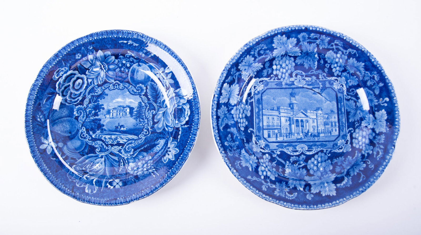 Two Staffordshire Historical Blue Plates: Two Staffordshire Historical Blue Plates England, early 19th century, from Wood's London Views series, a 10 1/4 inch plate depicting St. Phillip's Chapel Regent Street, the chapel rimmed in grape