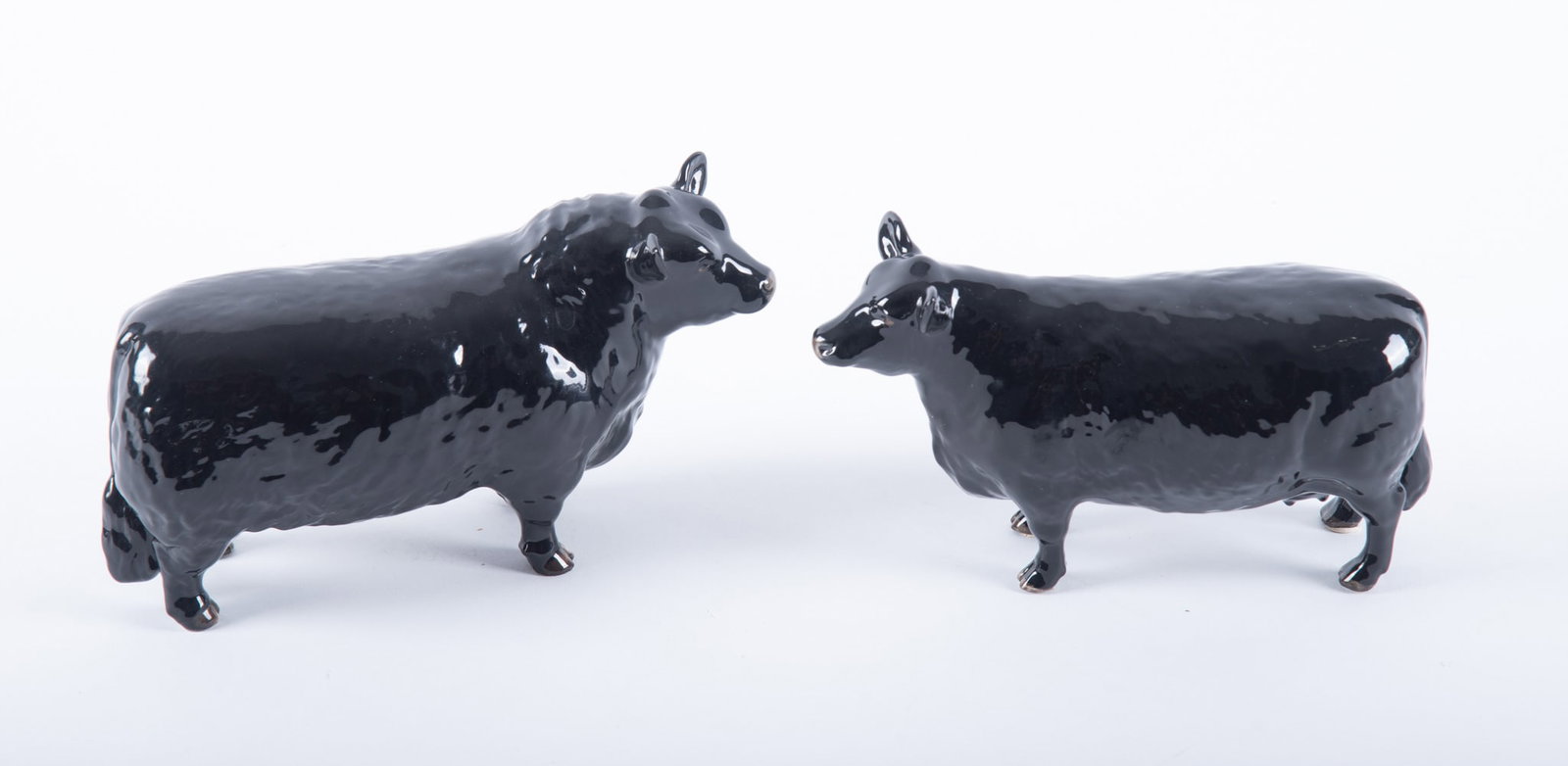 A Pair of Beswick Aberdeen Angus, Bull and Hiefer (1 of 3)