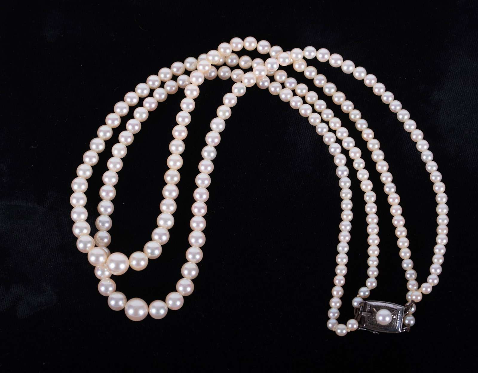Vintage Double Strand Graduated Cultured Pearl Necklace: These elegant pearls range in size from 7mm to 3 1/2mm. The length of the necklace is 17 inches and the clasp is sterling.