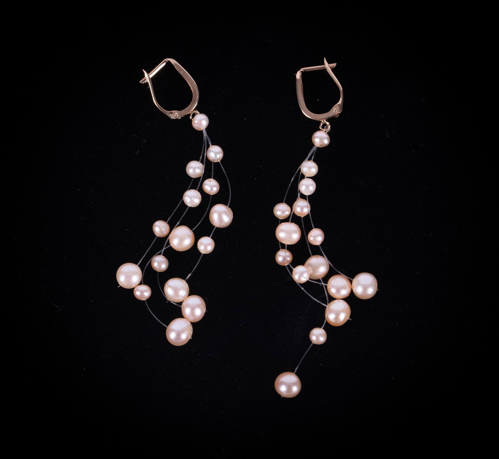 14K Yellow Gold & Cultured Pearl Dangle Earrings: The pearls on these dramatic earrings are a light pink. The largest pearl is 6.7mm and the smallest is 4mm. The length is 3 1/2 inches.